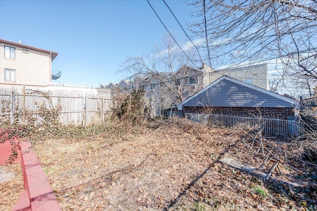 view of yard featuring fence