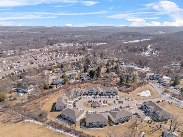 birds eye view of property featuring a mountain view and a residential view