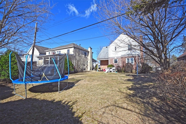 view of yard with a trampoline