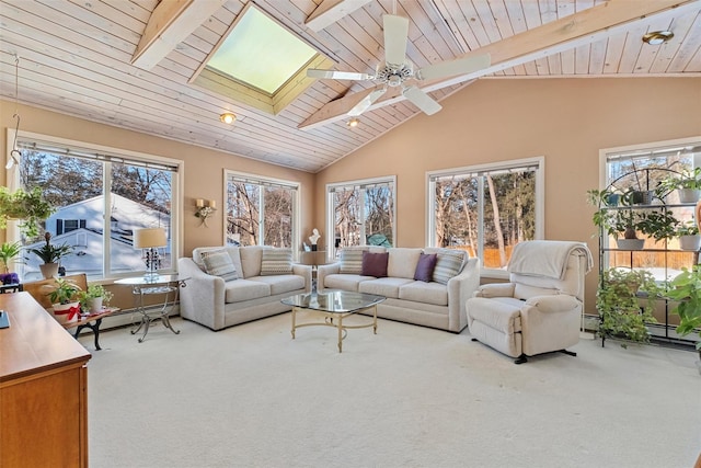 carpeted living area featuring vaulted ceiling with skylight, wood ceiling, and baseboard heating