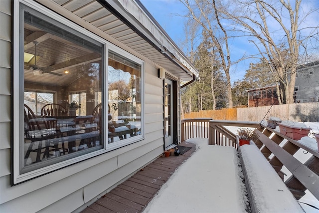 wooden terrace featuring fence