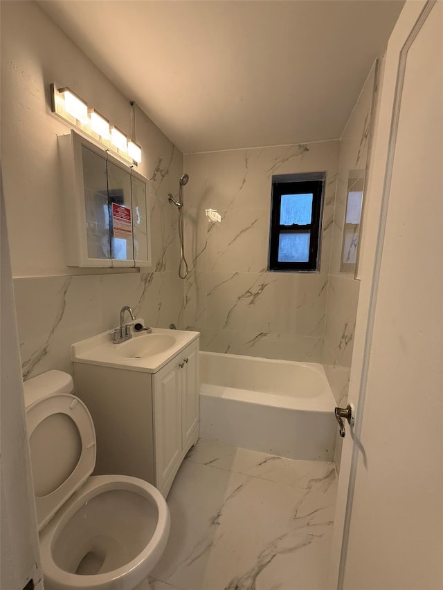 bathroom featuring marble finish floor, shower / bath combination, vanity, and toilet