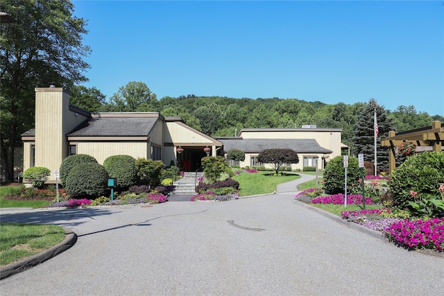 view of front of property featuring a chimney