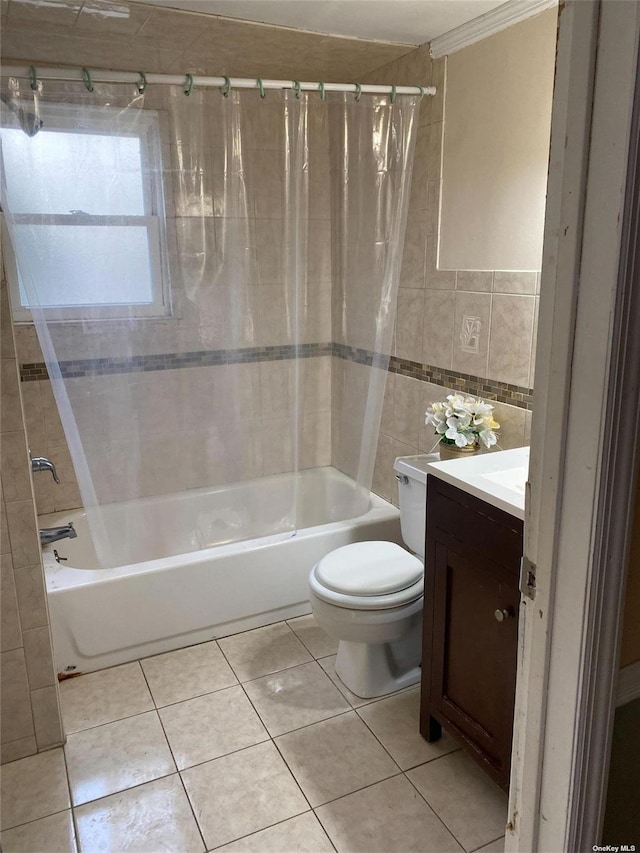 bathroom featuring shower / bath combination with curtain, tile patterned flooring, tile walls, and vanity