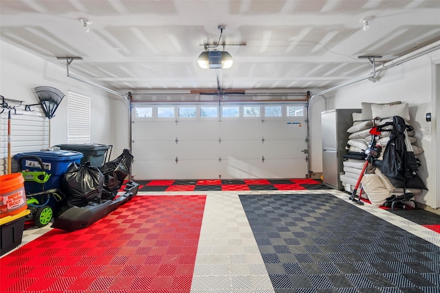 garage featuring a garage door opener