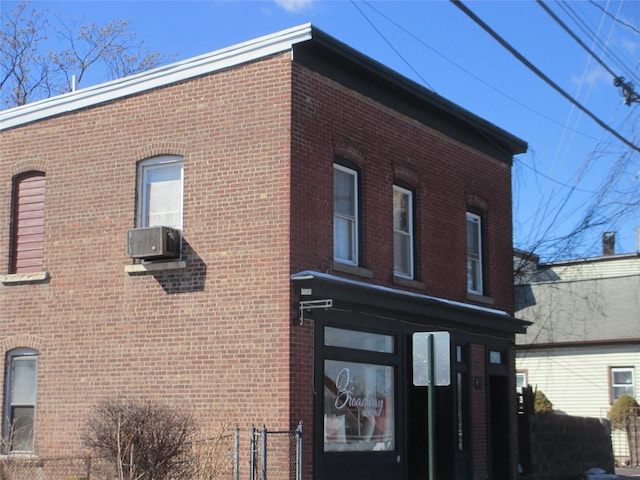 view of building exterior featuring cooling unit