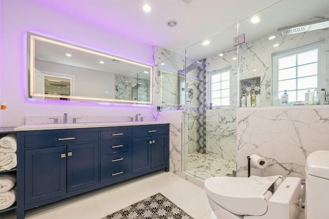 full bath with toilet, recessed lighting, a sink, a marble finish shower, and double vanity