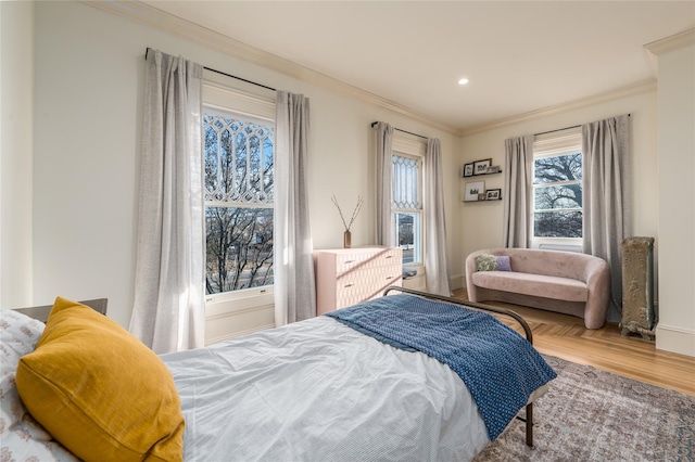 bedroom with ornamental molding, recessed lighting, baseboards, and parquet flooring