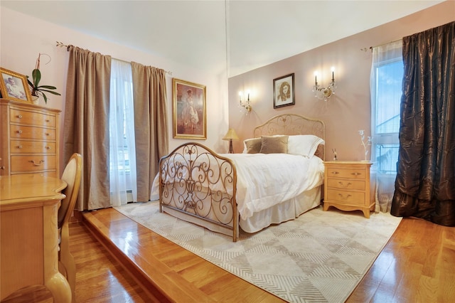 bedroom featuring light wood-style floors