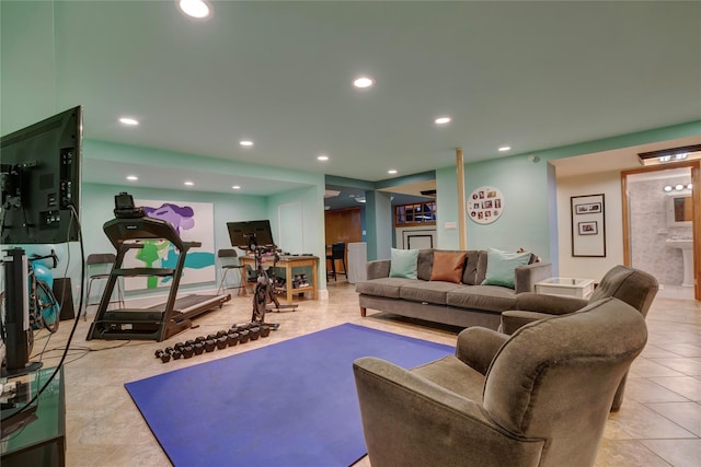 living area with tile patterned floors and recessed lighting