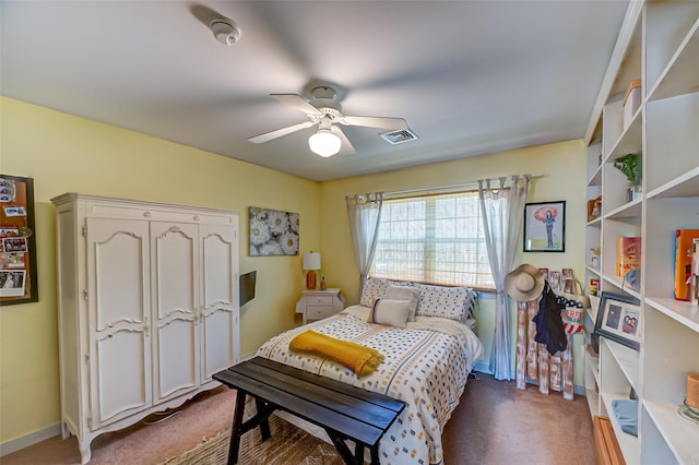 bedroom with baseboards, visible vents, dark carpet, and a ceiling fan