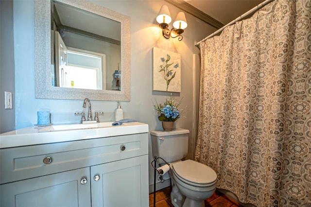 full bathroom with vanity and toilet