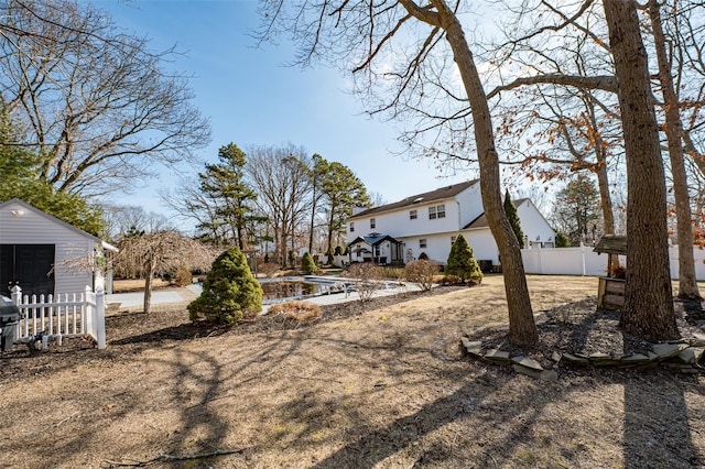 view of yard with fence