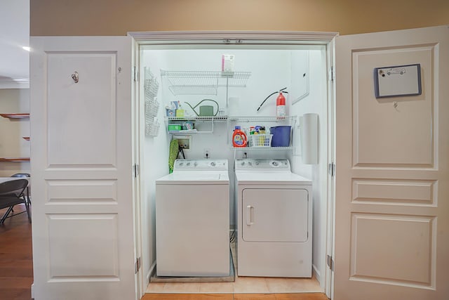 laundry room featuring washer and dryer and laundry area