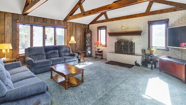 155 Shepard Dr, Southold, NY 11971 - carpeted living room featuring a brick fireplace, lofted ceiling with beams, and brick wall