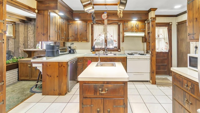 155 Shepard Dr, Southold, NY 11971 - kitchen with light tile patterned floors, under cabinet range hood, white appliances, light countertops, and an island with sink