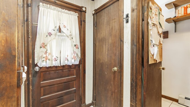 155 Shepard Dr, Southold, NY 11971 - interior space featuring light tile patterned floors, baseboards, and baseboard heating