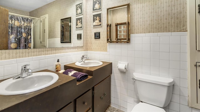 155 Shepard Dr, Southold, NY 11971 - full bath with wallpapered walls, a sink, and a wainscoted wall