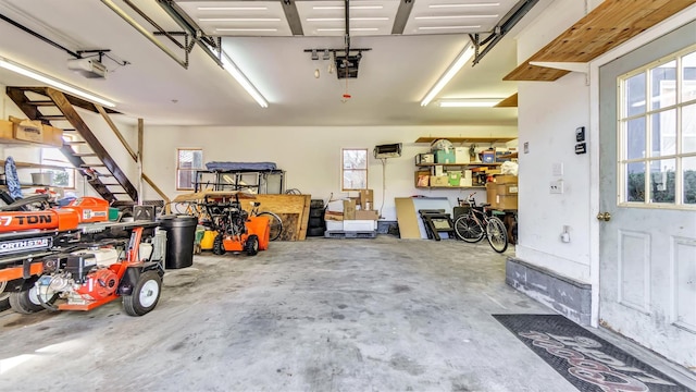 155 Shepard Dr, Southold, NY 11971 - garage featuring a garage door opener