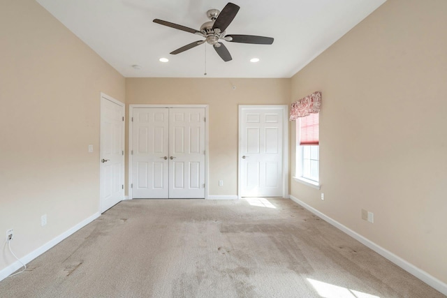 unfurnished bedroom featuring a ceiling fan, recessed lighting, a closet, carpet floors, and baseboards