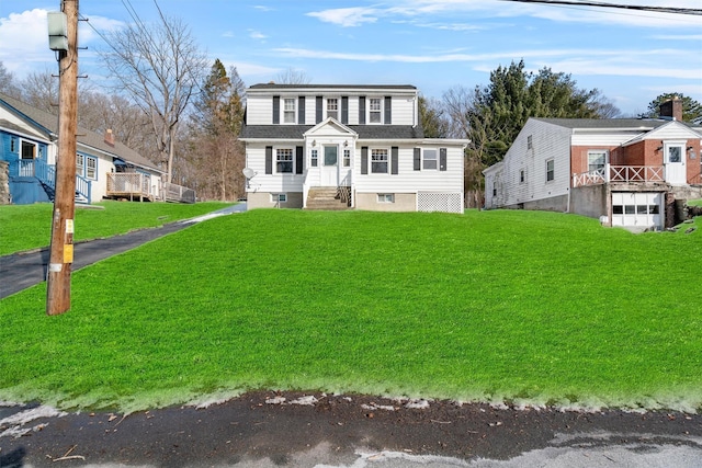 view of front facade featuring a residential view and a front lawn