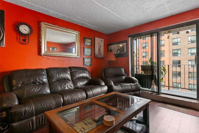 living area with a textured ceiling