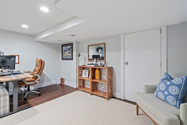 office space with light wood-style flooring, visible vents, baseboards, and recessed lighting