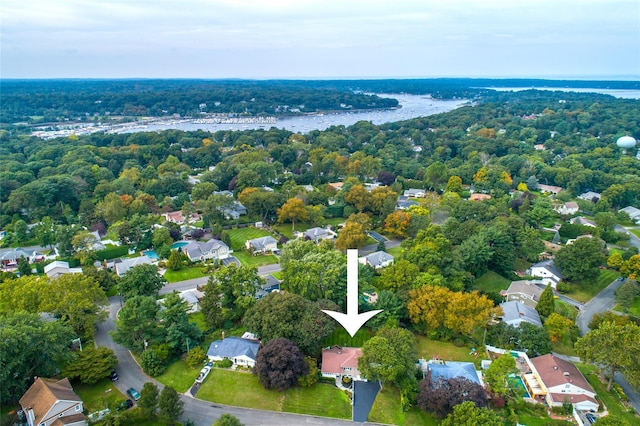 bird's eye view with a water view and a residential view