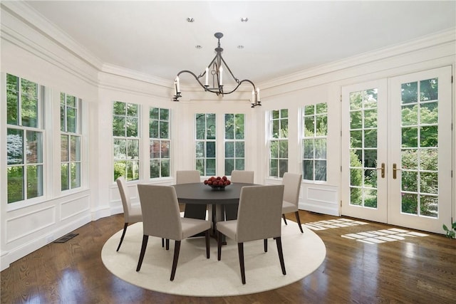 sunroom / solarium featuring visible vents, a chandelier, and french doors