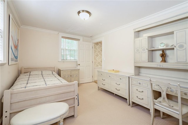 bedroom with light carpet and crown molding