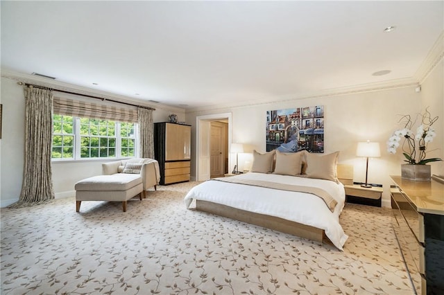 bedroom featuring light carpet, ornamental molding, visible vents, and baseboards