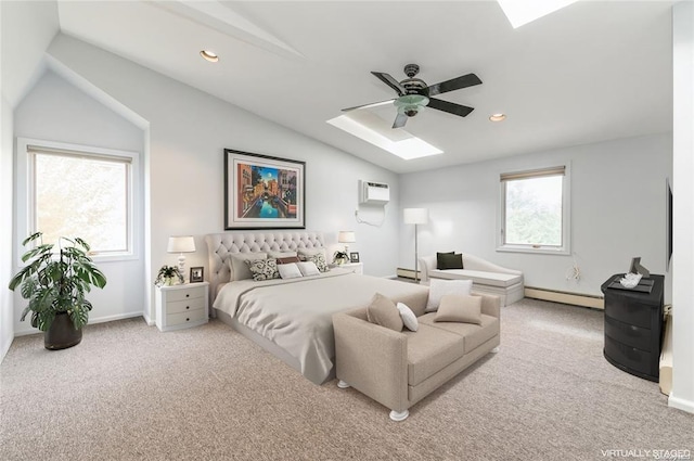 carpeted bedroom featuring a baseboard radiator, recessed lighting, baseboard heating, a wall mounted AC, and vaulted ceiling with skylight