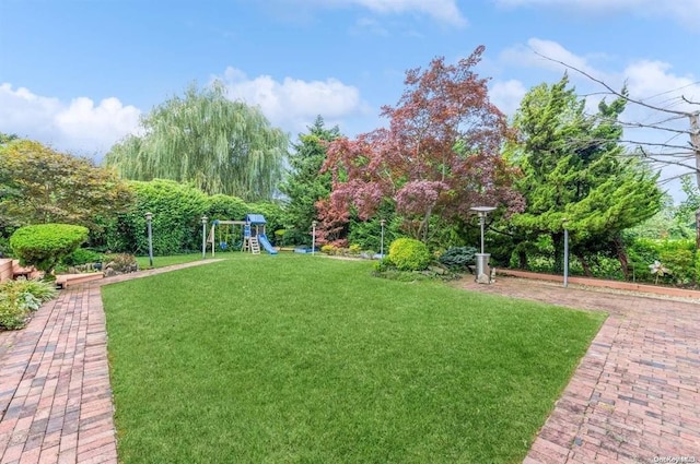 view of yard with playground community