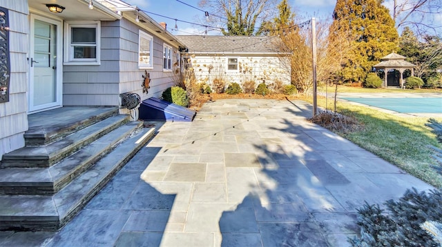 view of patio / terrace featuring a gazebo