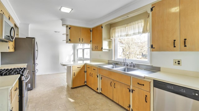 kitchen with open shelves, stainless steel appliances, light countertops, stone finish floor, and a sink