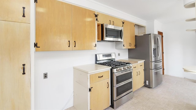 kitchen featuring open shelves, appliances with stainless steel finishes, light countertops, and light brown cabinetry