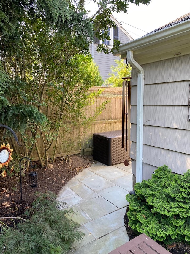 view of patio / terrace featuring fence