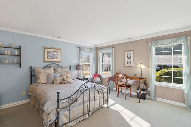 bedroom featuring light carpet, baseboards, and crown molding