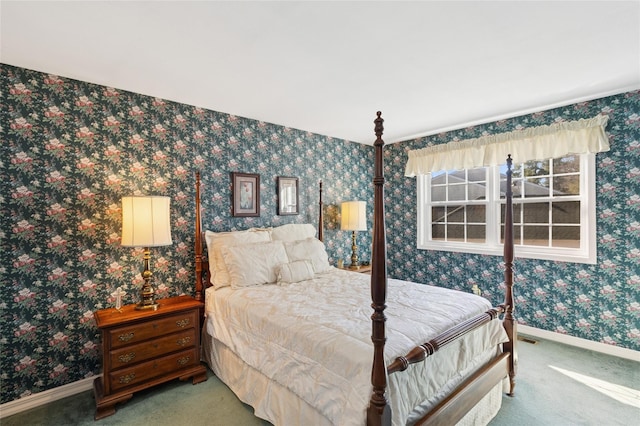 carpeted bedroom with baseboards, visible vents, and wallpapered walls