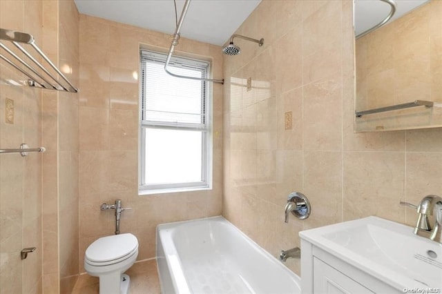 full bathroom with bathtub / shower combination, a healthy amount of sunlight, tile walls, and toilet