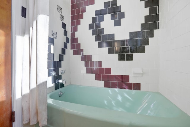 bathroom with a washtub