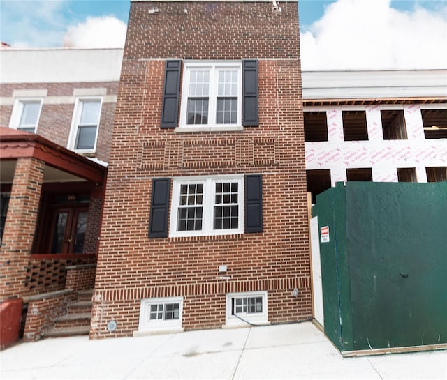 view of home's exterior featuring brick siding