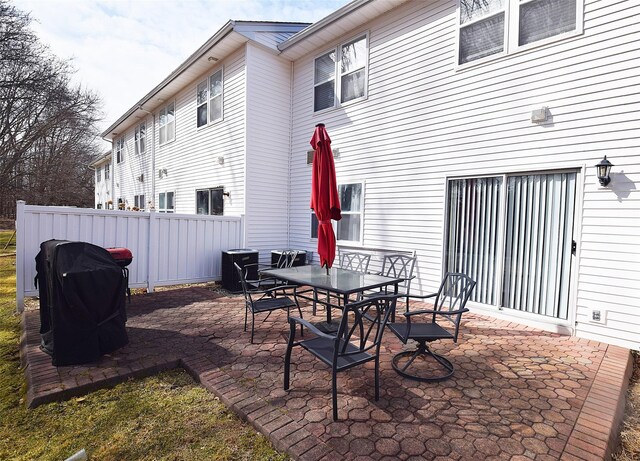 view of patio with fence and grilling area