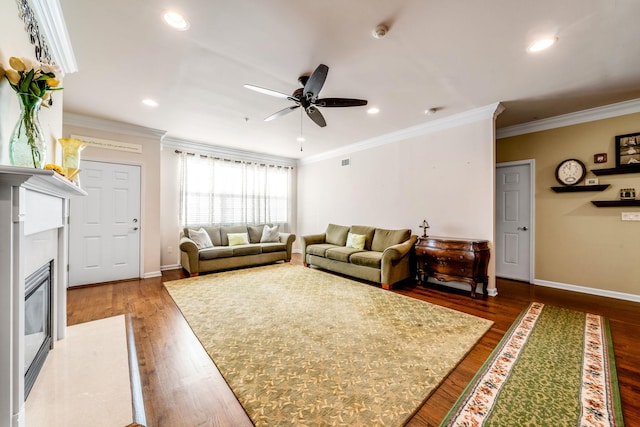 living room featuring dark wood-style floors, a fireplace with flush hearth, and baseboards