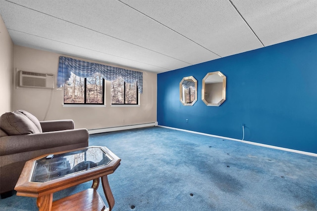 sitting room with a wall mounted AC, a baseboard heating unit, a textured ceiling, carpet flooring, and baseboards