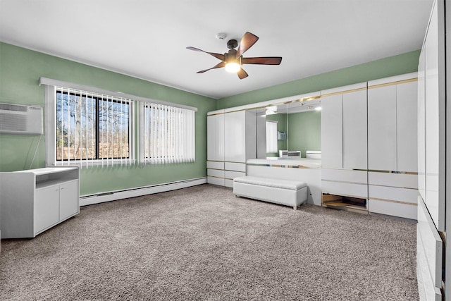 unfurnished bedroom with a baseboard heating unit, a wall unit AC, carpet, and a ceiling fan