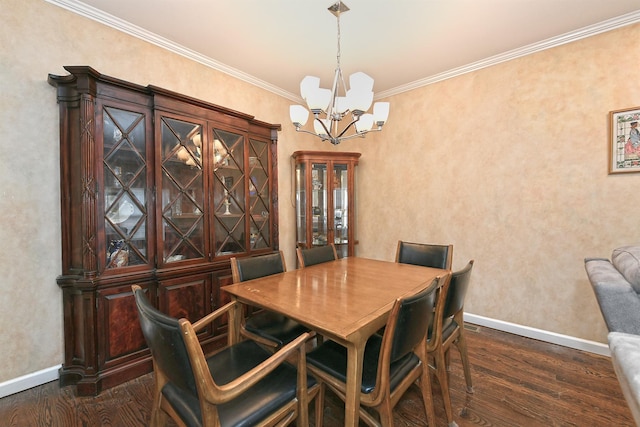 dining area with a notable chandelier, ornamental molding, dark wood finished floors, and baseboards