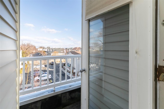 balcony featuring a residential view