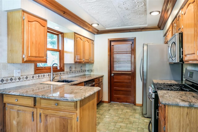 kitchen featuring crown molding, stainless steel appliances, tasteful backsplash, a sink, and light stone countertops