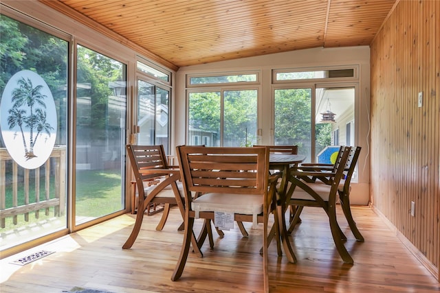 sunroom / solarium with wooden ceiling and visible vents